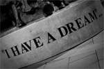 A black and white photo of a statue that says i have a dream.