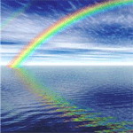 A rainbow is reflected in the water.